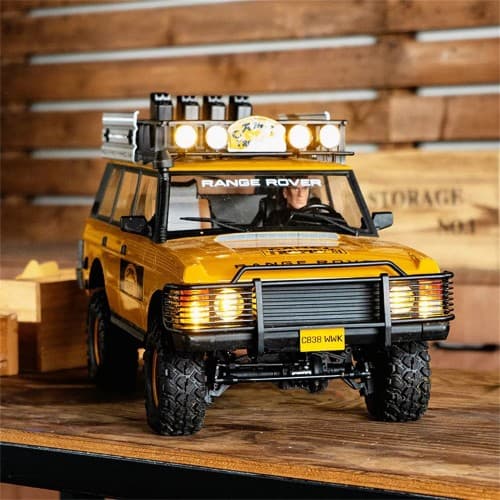 FMS FCX10 1/10 2.4G 4WD RC Car for Land Rover Camel Trophy Edition RS Officially Authorized Rock Crawler Off-Road Climbing Truck Two Speed LED Lights Straight Axle Metal Gears Drive Shaft Oil Filled Shocks Vehicles Models Toys 1